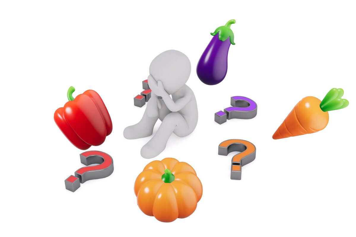いくつかの苦手な野菜を目の前に、しゃがみこみ頭を抱える白いピクトグラム。どうしていいか分からず、野菜と一緒に、はてなマークも散らばっている。
